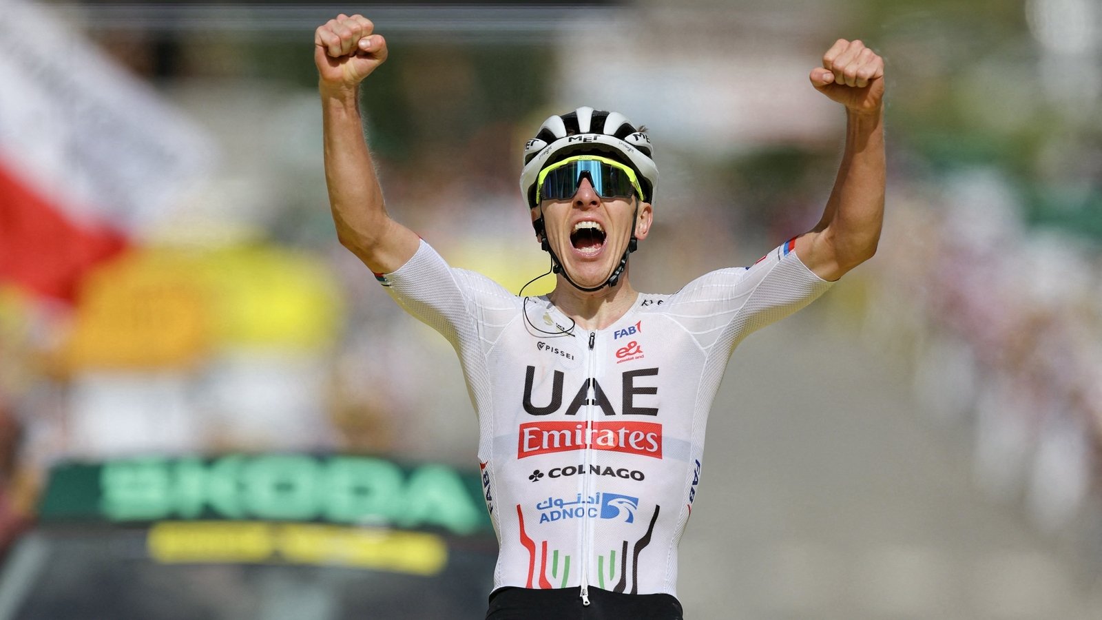 Pogacar wins first mountain stage to take Tour lead