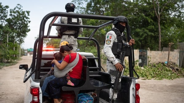 The Mexican Army and National Guard evacuate residents from neighborhoods ahead of Hurricane Beryl's landfall