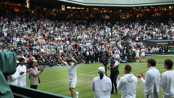 Andy Murray waves to the crowd at Centre Court