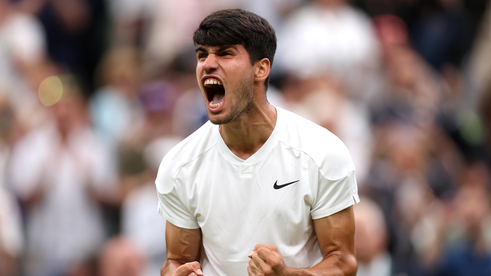 Alcaraz survives Tiafoe battle to sustain title defence