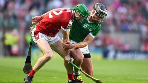 Cork's Seamus Harnedy (L) in action against Gearóid Hegarty during their Munster round-robin clash