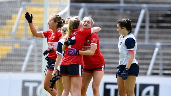 Corl's Daire Kiely and Amy McDonagh embrace after the final whistle