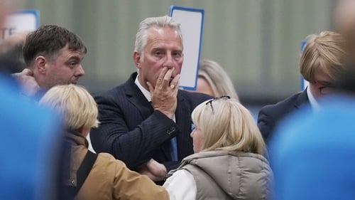 Ian Paisley watches a partial recount of votes in the North Antrim count at Meadowbank Sports Arena