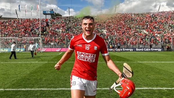 Player of the Match Brian Hayes celebrates in front of the Hill