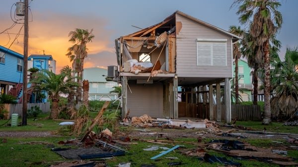 A home is severely damaged after Hurricane Beryl swept through the area in Freeport, Texas yesterday