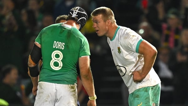 Ireland's Caelan Doris and South Africa's Pieter-Steph du Toit speak to referee Luke Pearce during Saturday's first Test