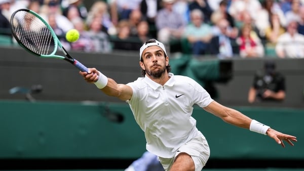 Lorenzo Musetti plays a forehand in his quarter-final victory over Taylor Fritz