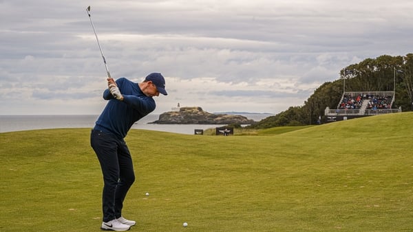 Rory McIlroy plays his second shot on the 13th hole at the Renaissance Club