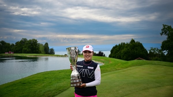 Ayaka Furue celebrates after victory at Evian Resort Golf Club