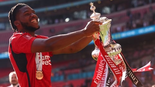 Willy Kambwala celebrates winning the FA Cup last season with the Red Devils