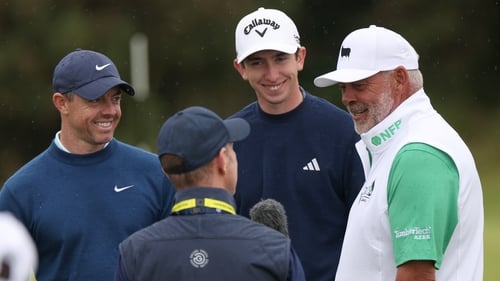 McIlroy, McKibbin and Clarke made their way around the course together