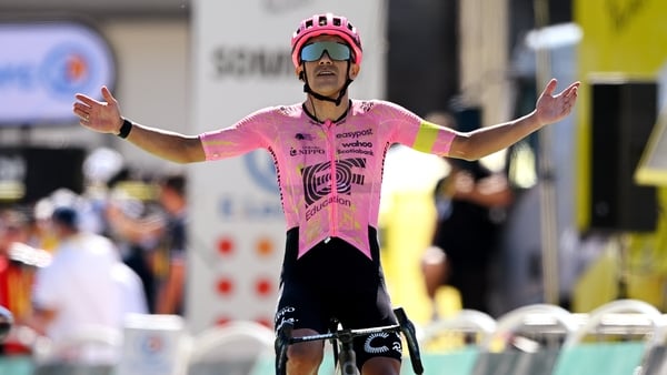 Richard Carapaz celebrates his stage win in the alpine resort of SuperDevoluy