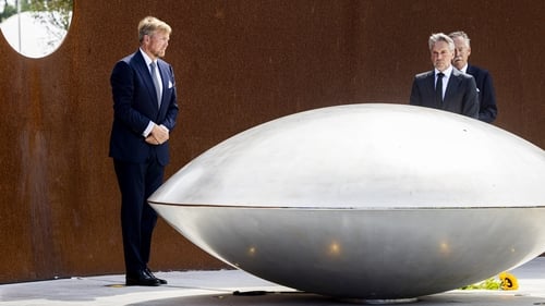 King Willem-Alexander of The Netherlands (L) and Dutch Prime Minister Dick Schoof at the commemoration