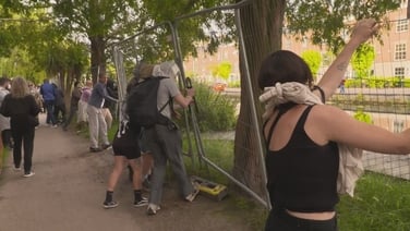 Group of protesters tear down barriers along Dublin's Grand Canal