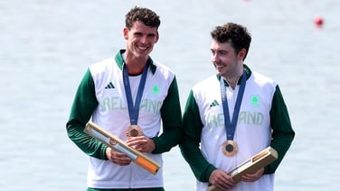 Paris 2024: Daire Lynch and Philip Doyle are presented with their bronze medals in the men's double sculls