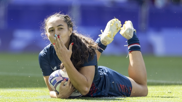 Alex Sedrick #8 of the United States Women's National Team blows a kiss to family after scoring a try during a women's Pool C match between the United States and Japan on day two of the Olympic Games Paris 2024