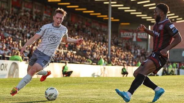 Waterford match-winner Sam Glenfield taks on James Akintunde