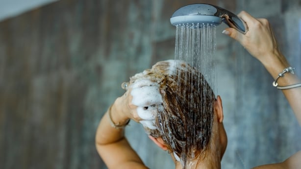 Washing hair with shampoo