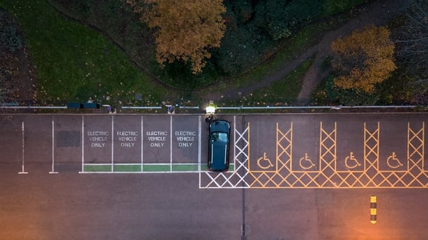 electric car parked and charging