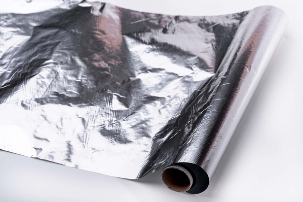 Near empty roll of tin foil.