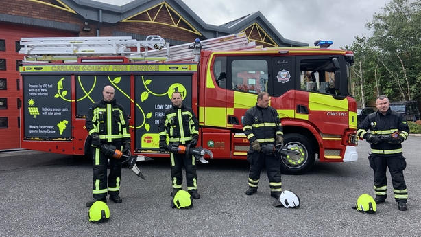 Ronan Boyle, Daniel Fitzpatrick, Darrell Hayden and Joseph O'Reilly with rescue tools that are charged in the fire engine by solar panels