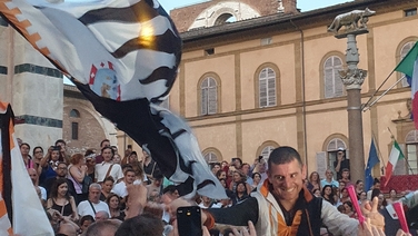 Palio di Siena:  Lupa fans celebrate outside the Duomo in Florence