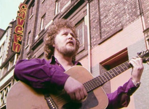 Jim McCann performing outside The Cavern in Liverpool, 1974