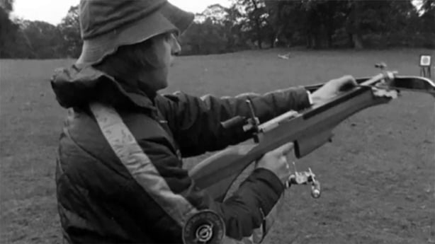 A marksman points a crossbow at a target during a contest in County Wicklow, 1974