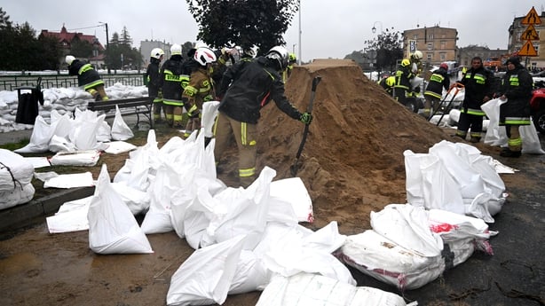 Firefighters fill sand bags in Glucholazy, southern Poland