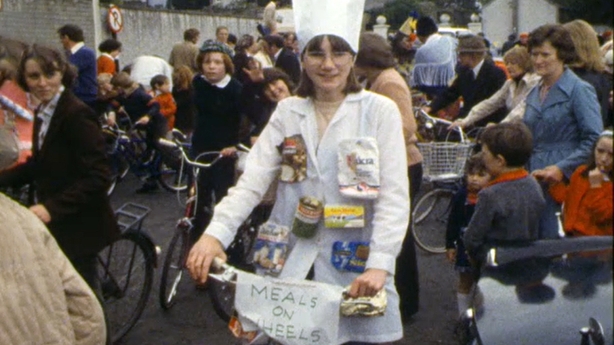 A girl in fancy dress taking part in the Athy charity cycle tour, 1979