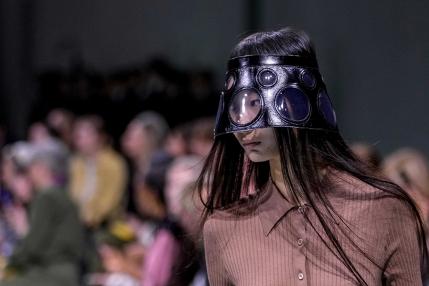 A model wears a creation as part of the Prada Spring Summer 2025 collection