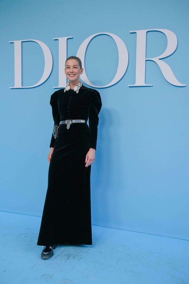 Rosamund Pike arrives for the Dior Spring/ Summer 2025 ready-to-wear collection