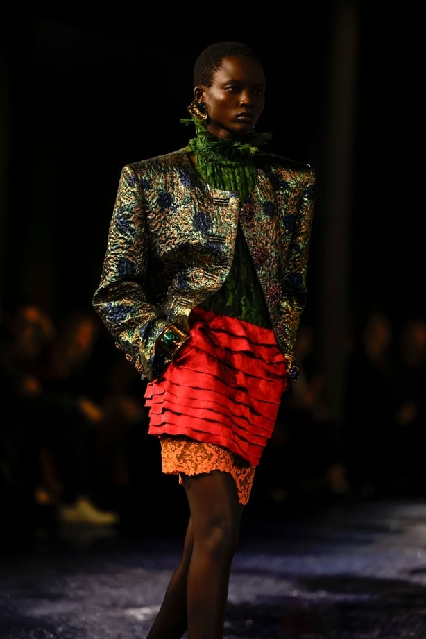 A model wears a creation as part of the Saint Laurent Spring/Summer 2025 collection