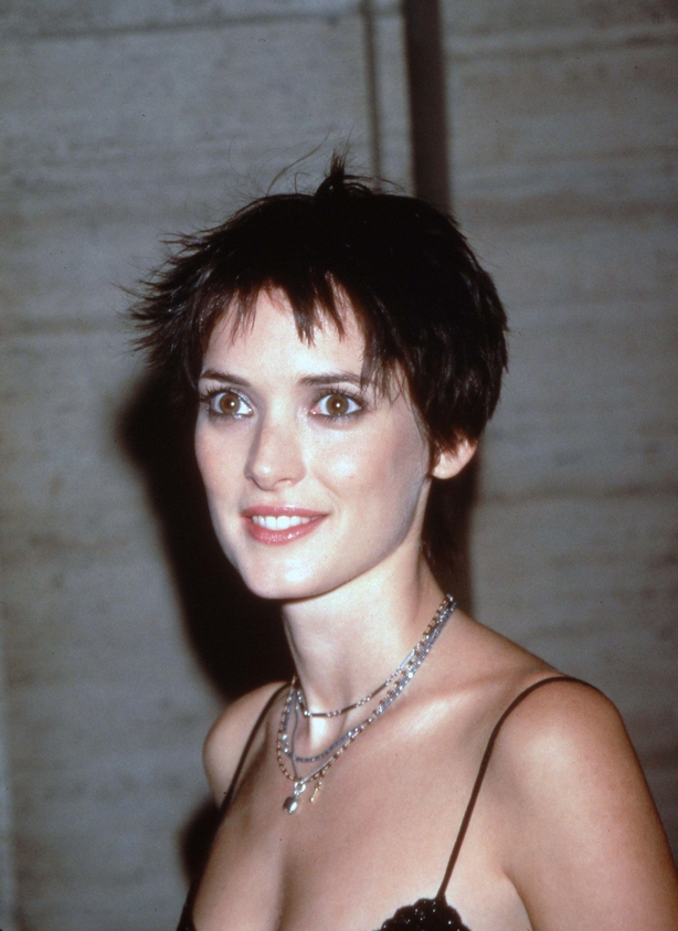 Winona Ryder smiles off camera in 1998