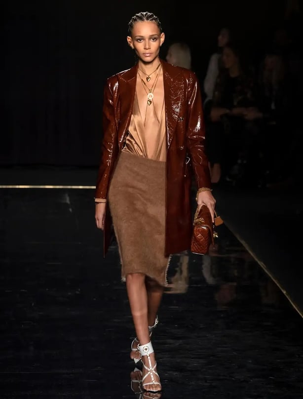 Versace showcased a mix of rich browns in their autumn/winter runway (Alamy/PA)