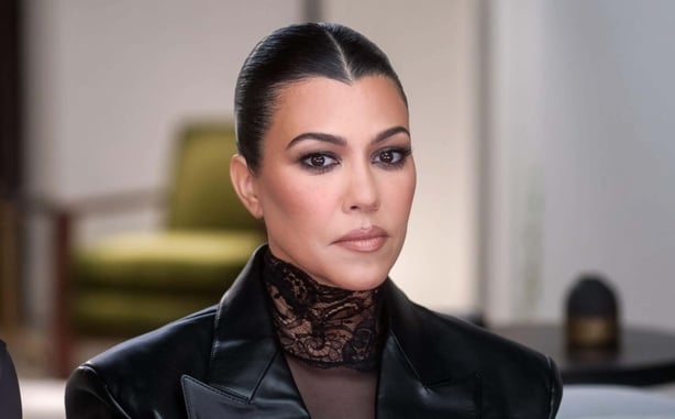 Kourtney Kardashian wears slicked back hair