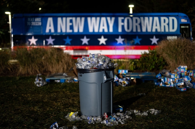 Chairs and rubbish sit in an empty field after the election night watch party at Howard University in Washington