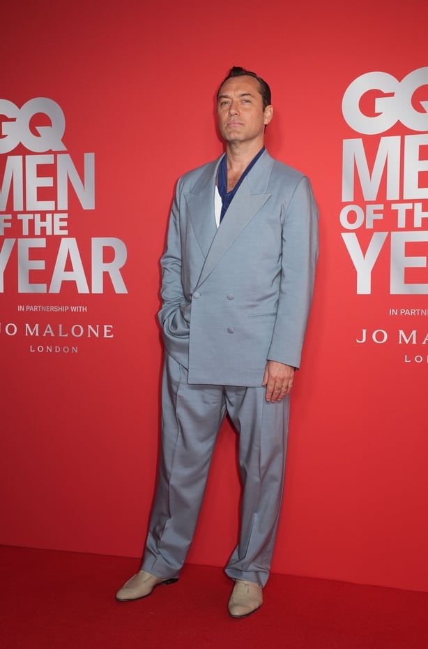 Jude Law attends the GQ Men of the Year photocall at Kensington Roof Gardens
