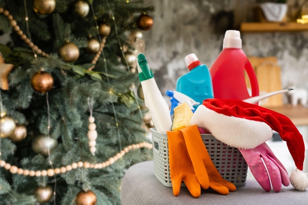 Cleaning caddy with Christmas tree in background
