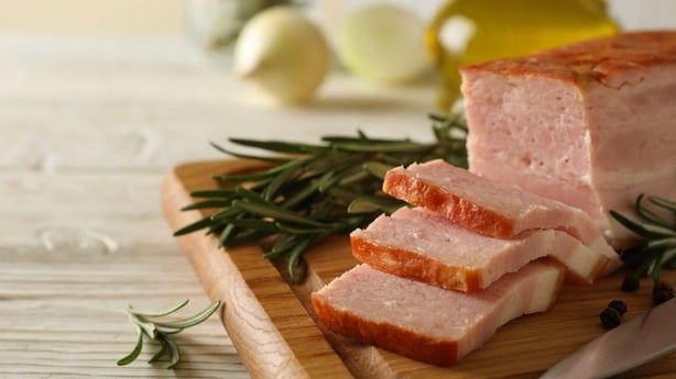 Concept of tasty snack with bacon on cutting board