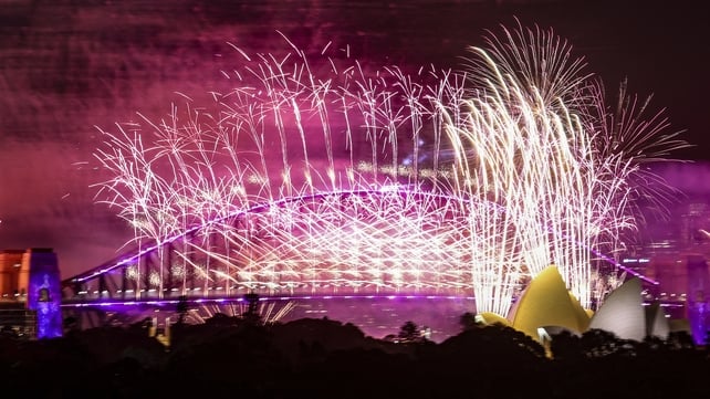 Fireworks light up the sky over Sydney Harbour Bridge and Sydney Opera House during 2025 New Year celebrations