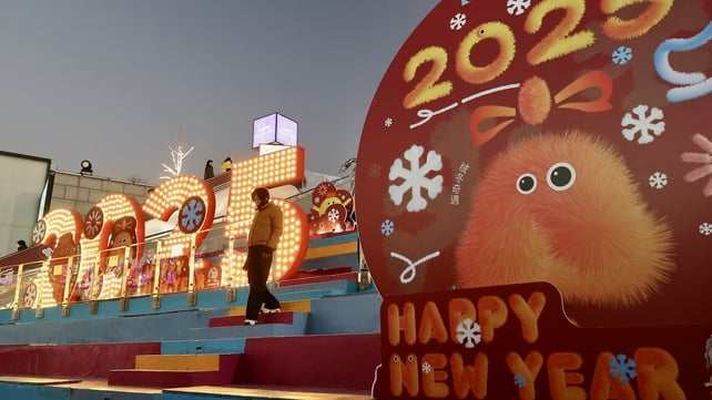 The 2025 New Year's Eve numerals are lit up in Beijing, China