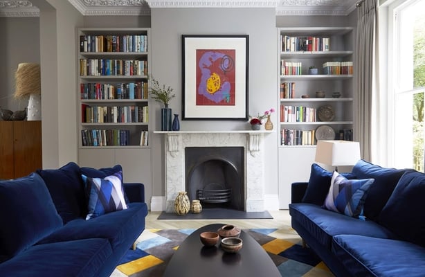 A striking modern living room filled with characterful elements adds personality and warmth to the space