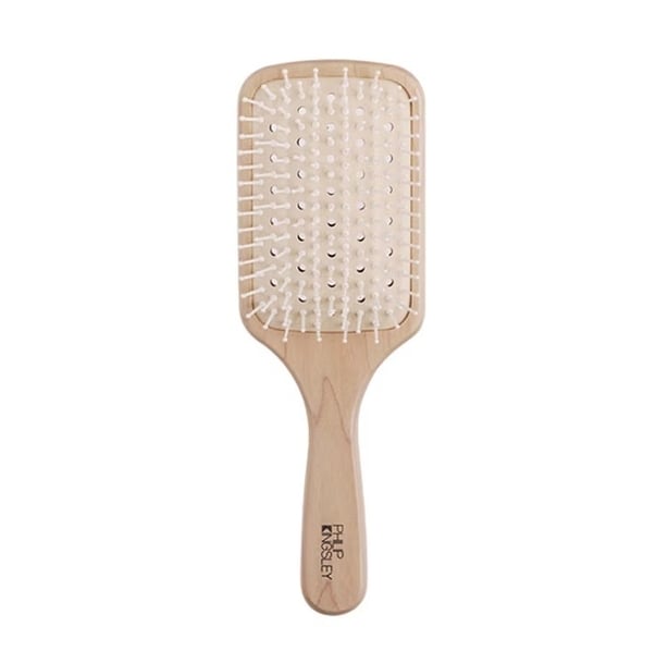 Vented paddle brush to allow air flow from hair drying