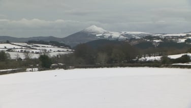 Sugarloaf mountain covered in blanket of snow