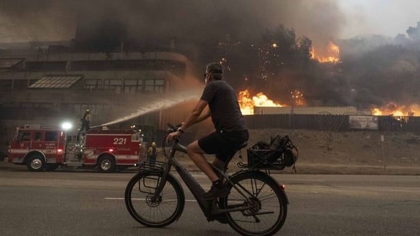 Wildfires rip through Los Angeles, killing at least two