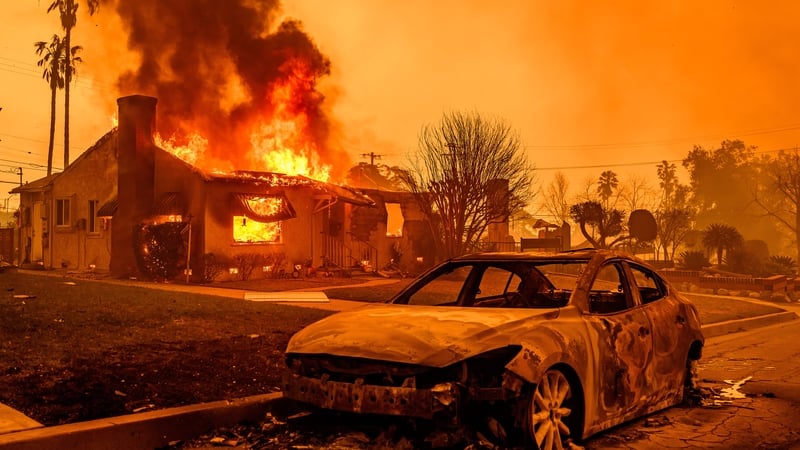 At least five dead as Los Angeles surrounded by wildfires