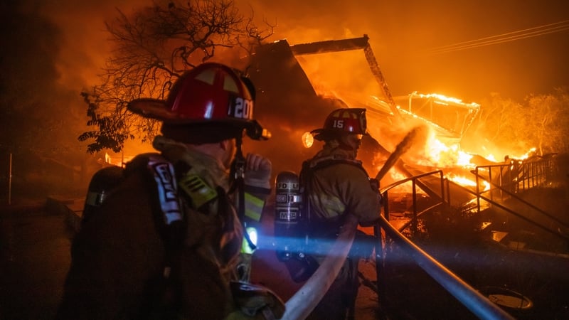 LA wildfires rage as strong winds put millions on alert