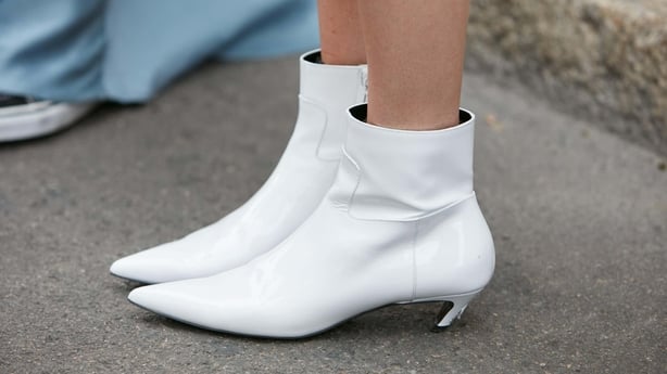 Woman with white pointed low boots before Max Mara fashion show, Milan Fashion Week street style on September 22, 2016 in Milan.