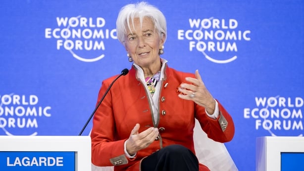 Christine Lagarde gestures as she addresses the audience at Davos yesterday